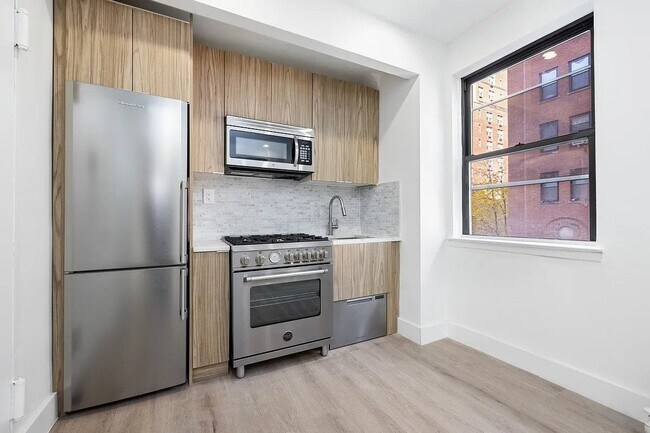 Foto del edificio - 138 E 38th St