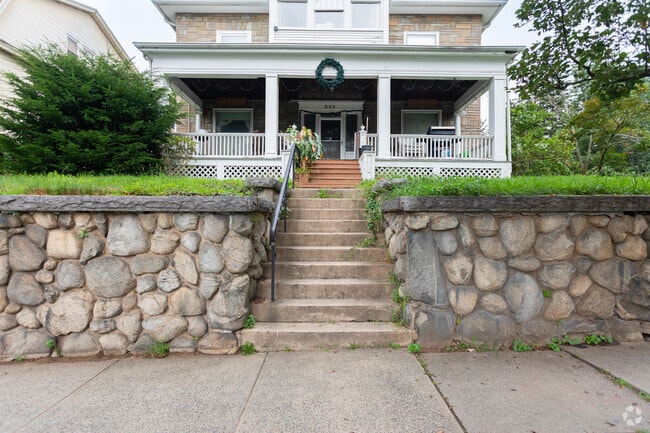 Many homes have beautiful covered porches.
