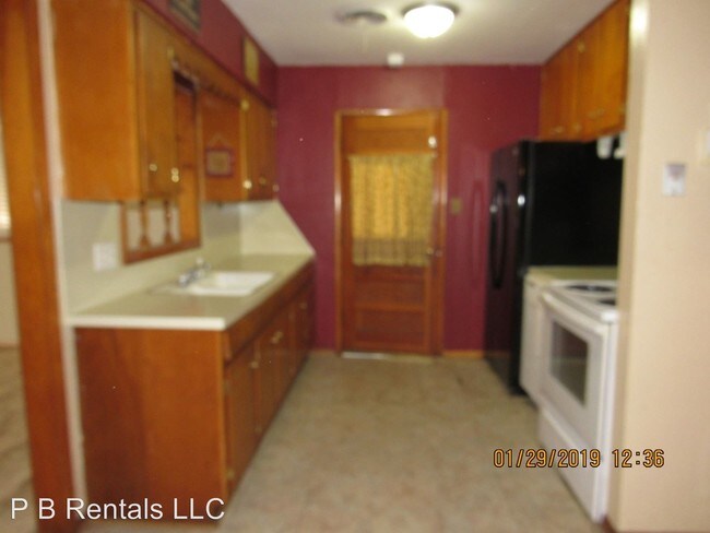 Building Photo - 3 br, 1.5 bath House - 2401 NW 38th Place