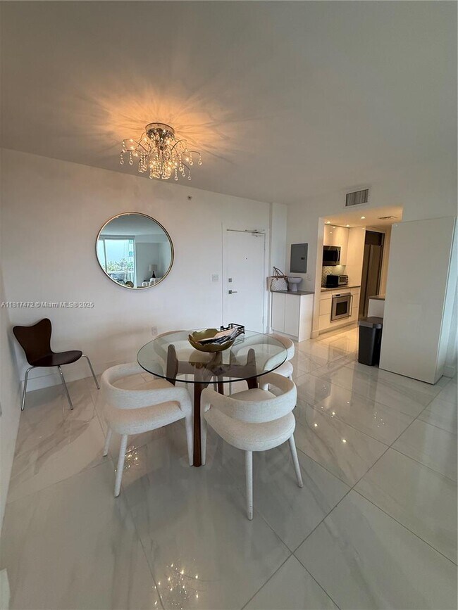 Building Photo - 10275 Collins Ave
