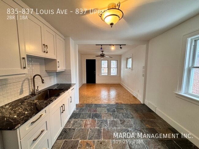 Building Photo - NEWLY RENOVATED 2 BED/1 BATH UPPER W/ LARGE DECK + 40% OF UTILITIES