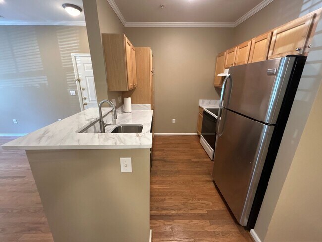 Building Photo - 1 Bedroom | 1.5 Bathroom Ground Level Rale...