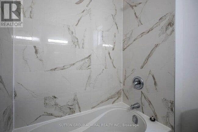 Building Photo - 1969 Queen St E