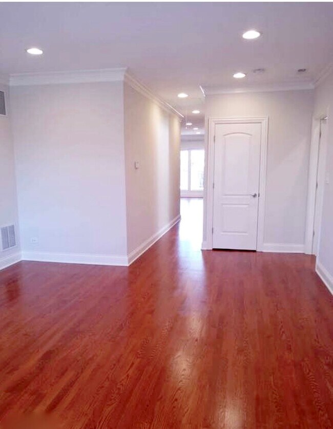Living room with coat closet - 4511 N Mason Ave