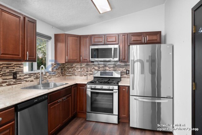 Building Photo - 23395 NE Village Ct