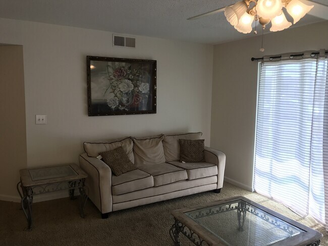 Foto del edificio - FIRST FLOOR, SURFSIDE BEACH THREE-BEDROOM CONDO, AVAILABLE SOON!!