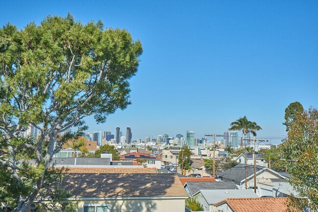 Building Photo - Spend the Holiday in Style | Fully Furnish...