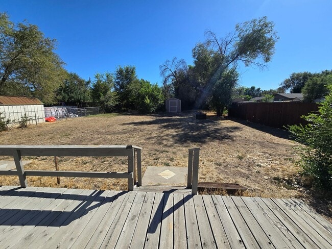 Building Photo - READY NOW. Huge backyard, lovely two bedro...