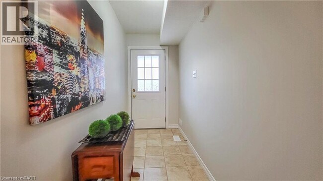 Building Photo - 128 Udvari Crescent