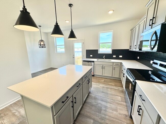 Foto del edificio - New construction! Three bedroom townhome off Poplar Tent Rd
