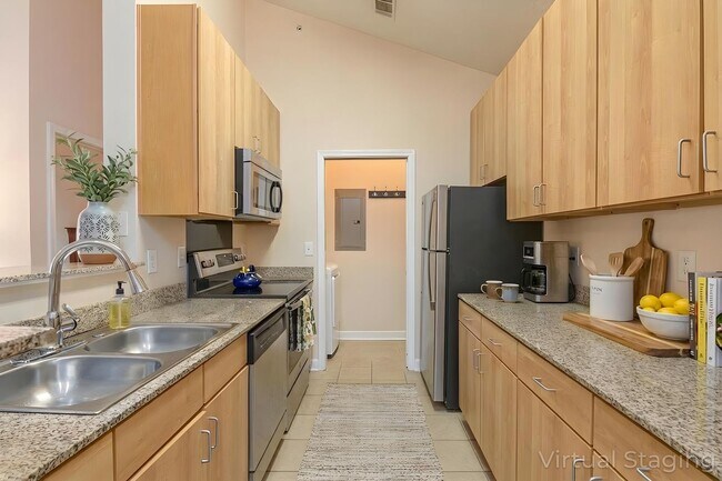 Building Photo - Beautiful 1-Bedroom Condo with Detached Garage in Eastwood Village Complex (Water Included)