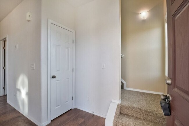 Building Photo - Immaculate 3-Bedroom Townhome with Stainless Steel Appliances and Attached Garage Near Peterson SFB