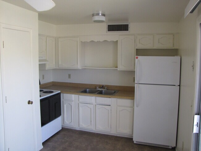 Building Photo - 4143-4147 E Desert Pl