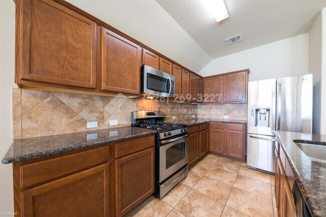 Foto del edificio - 4 br, 3 bath House - 11104 Cain Harvest Dr -