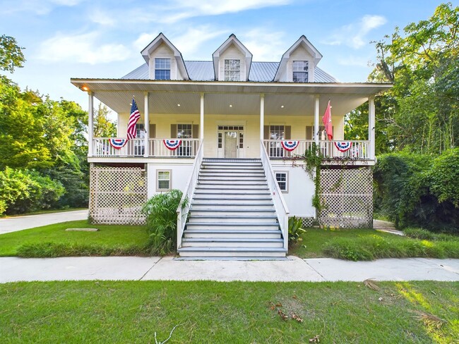 Building Photo - Private Furnished Riverfront Estate with Dock & Guest Apartment