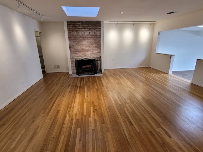 Living Room with Fireplace - 3406 Corinth Ave