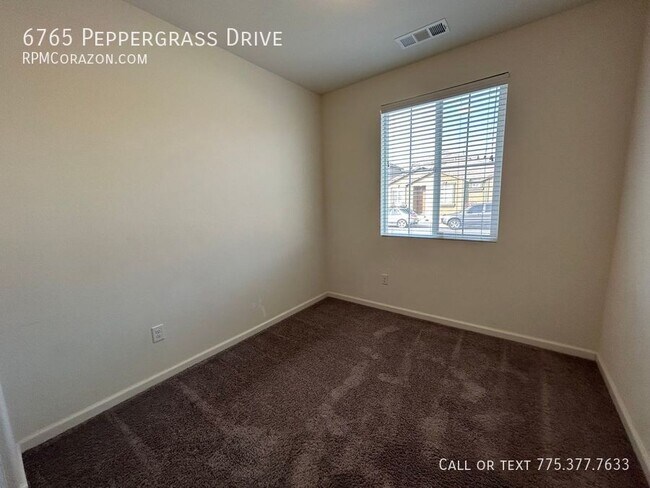 Foto del edificio - 6765 Peppergrass Drive