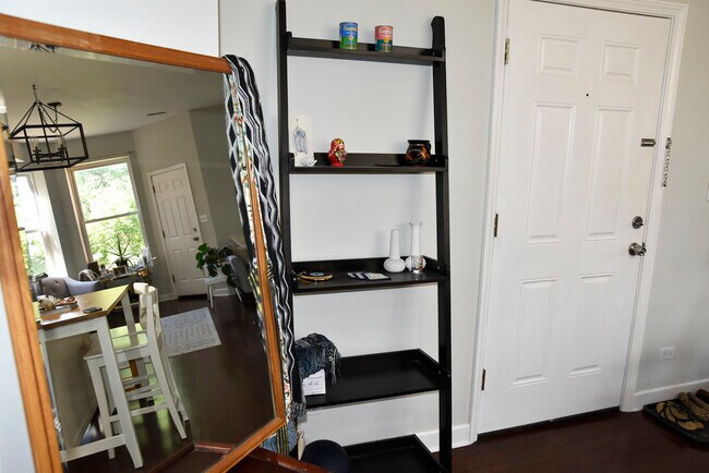 Front door opens into open-concept kitchen, dining/living room - 2315 W Rice St