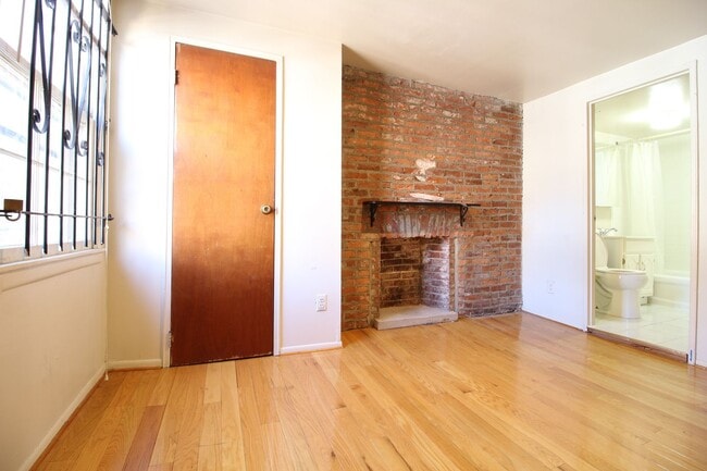 Building Photo - Spacious 2 BR 2 BA w/ Decorative Fireplace...