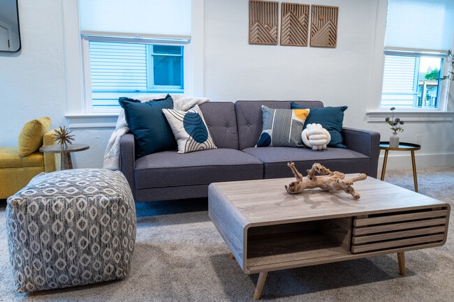 Relax in our cozy living room. Coach turns into sofa bed. - 1519 32nd Ave