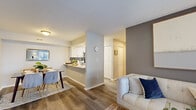 This 730 square foot apartment in Indianapolis offers a harmonious blend of style and functionality. The single-story layout encompasses one bedroom, one bathroom, and a variety of well-appointed spaces. The primary bedroom, measuring 150 square feet, provides ample room and is adorned with contemporary furnishings and soothing neutral tones. The living area is bathed in natural light from large windows, featuring a comfortable seating arrangement and stylish decor. The kitchen boasts sleek white cabinetry, stainless steel appliances, and a subway tile backsplash, creating a modern culinary space. A dedicated office area offers a productive work-from-home environment, while the bathroom showcases clean lines and updated fixtures. The apartment also includes a convenient in-unit laundry. Throughout the space, wood-look flooring, soft gray walls, and carefully chosen accessories create a cohesive and inviting ambiance. This thoughtfully designed apartment maximizes its compact footprint, offering a perfect balance of comfort and style for urban living.
