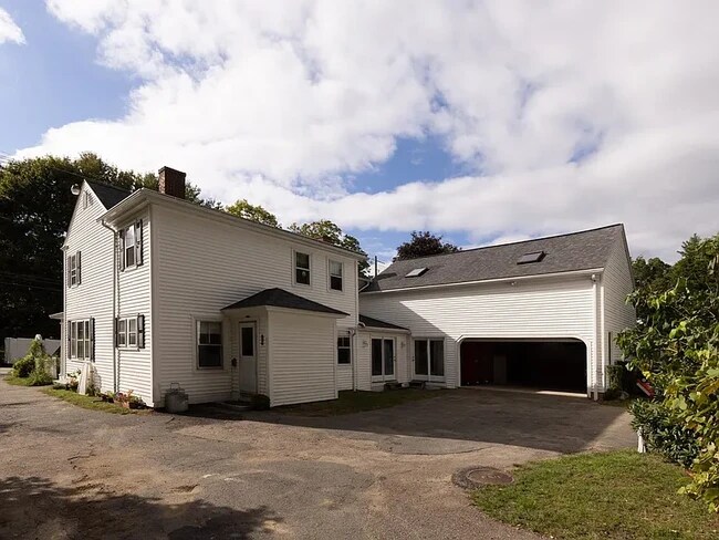 Back of house and 2 car garage - 215 Post Rd