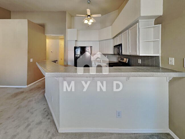 Building Photo - 5225 W Reno Ave Unit 204