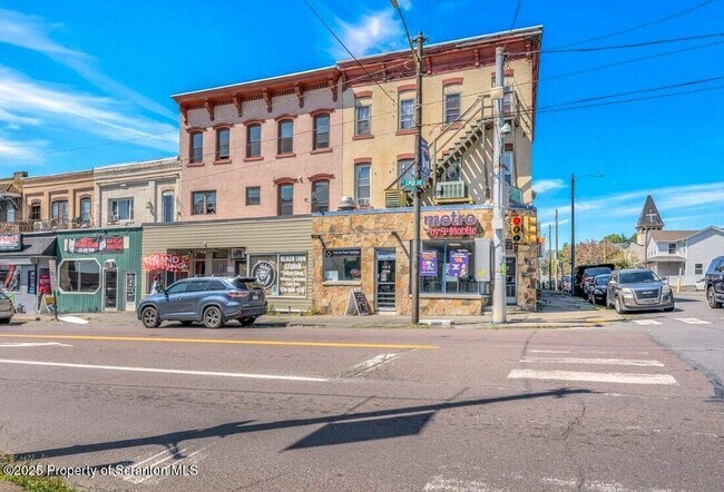 Foto del edificio - 104-104 S Main Ave