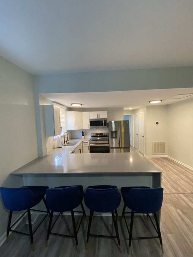 New Quartz counter top and stainless steel appliances. - 3300 8th Ave SW