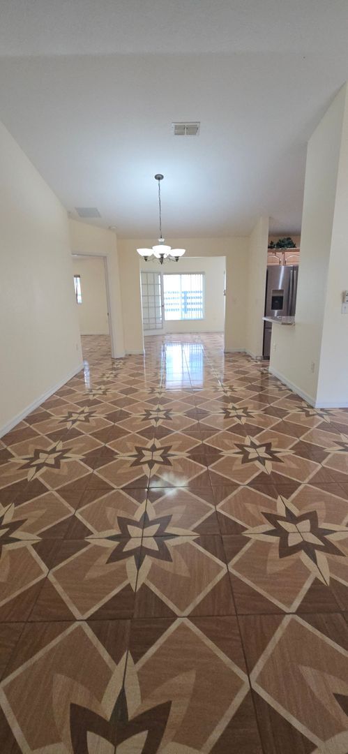Building Photo - Move-In Ready 2BR/2BA Home with Solar & Bo...