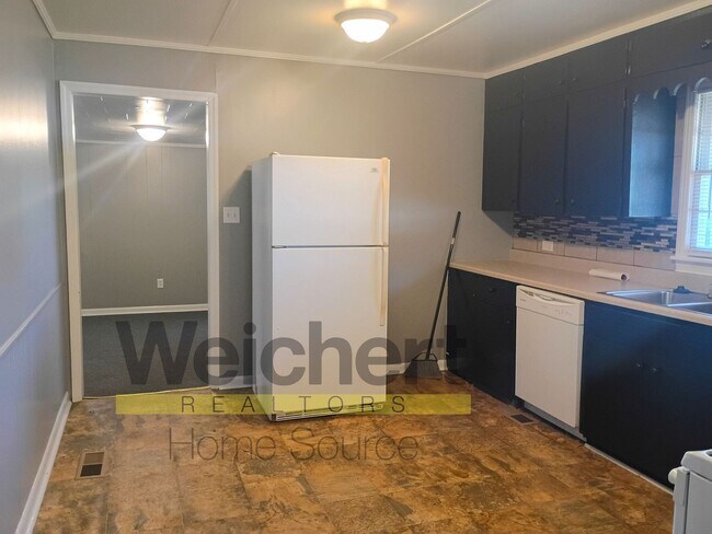 Foto del edificio - Quality finishes and adaptable design in a desirable location