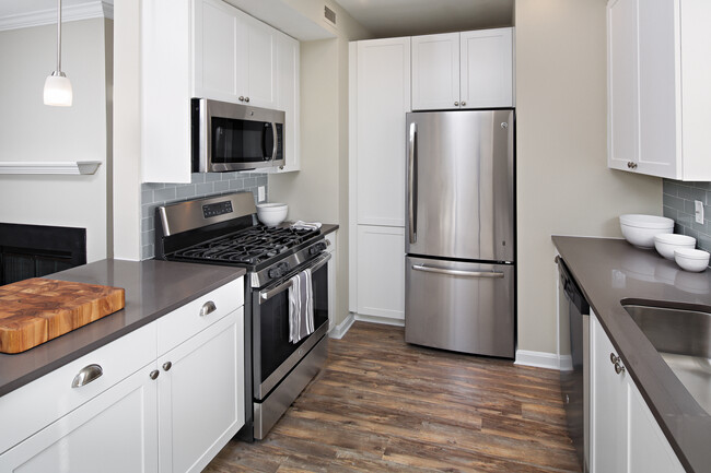 Kitchen with Stainless Steel Appliances and Quarts Countertops - Avalon at Florham Park