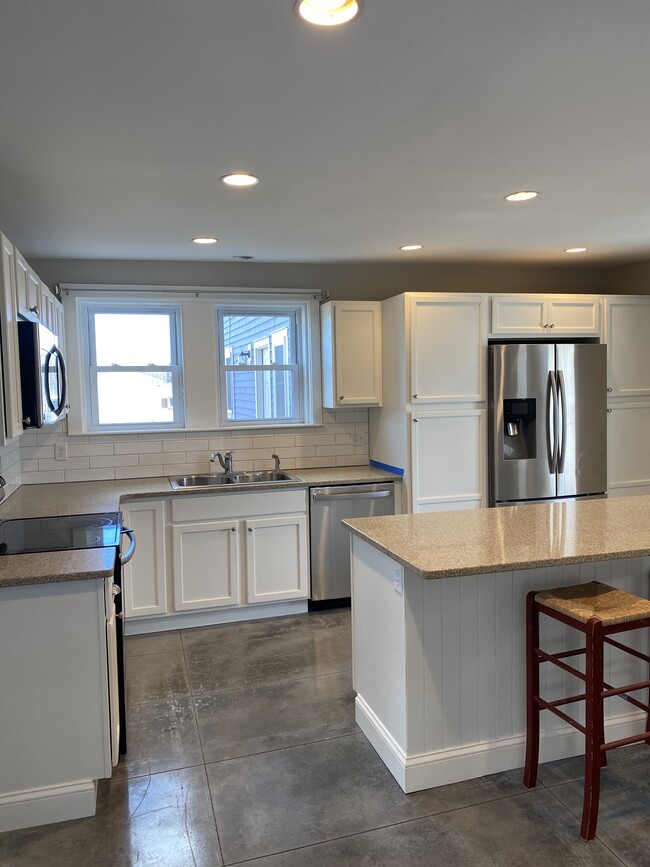 Kitchen with Granite and Island seating - 27 Stevenson Rd