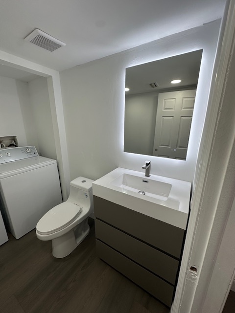 half bath with washer/dryer - 11910 SW 13th Ct