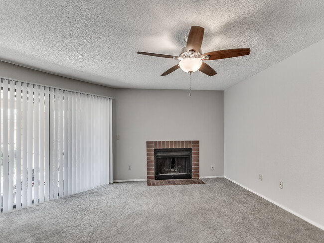 Copperfield Apartments - Living Room With Fireplace - Copperfield Apartments