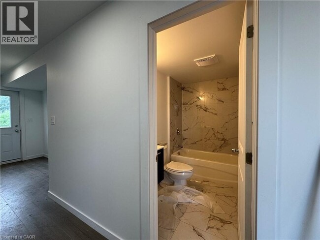 Building Photo - 107 HighRiver Trl
