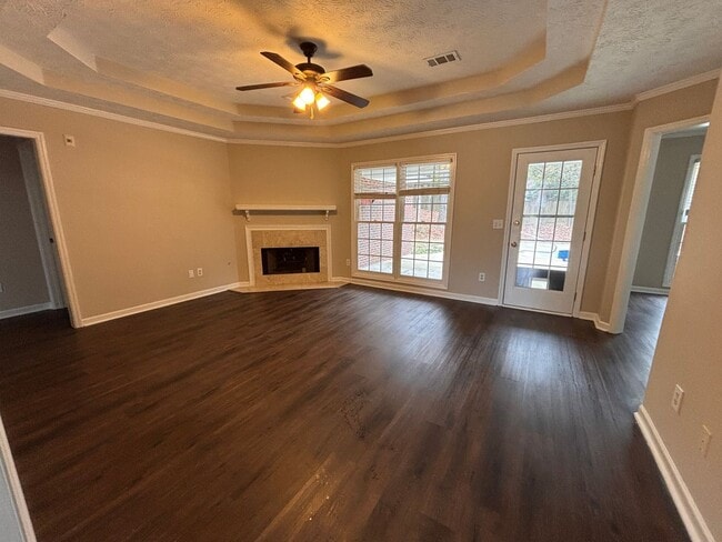 Building Photo - Executive Rental with Pool and Fenced yard