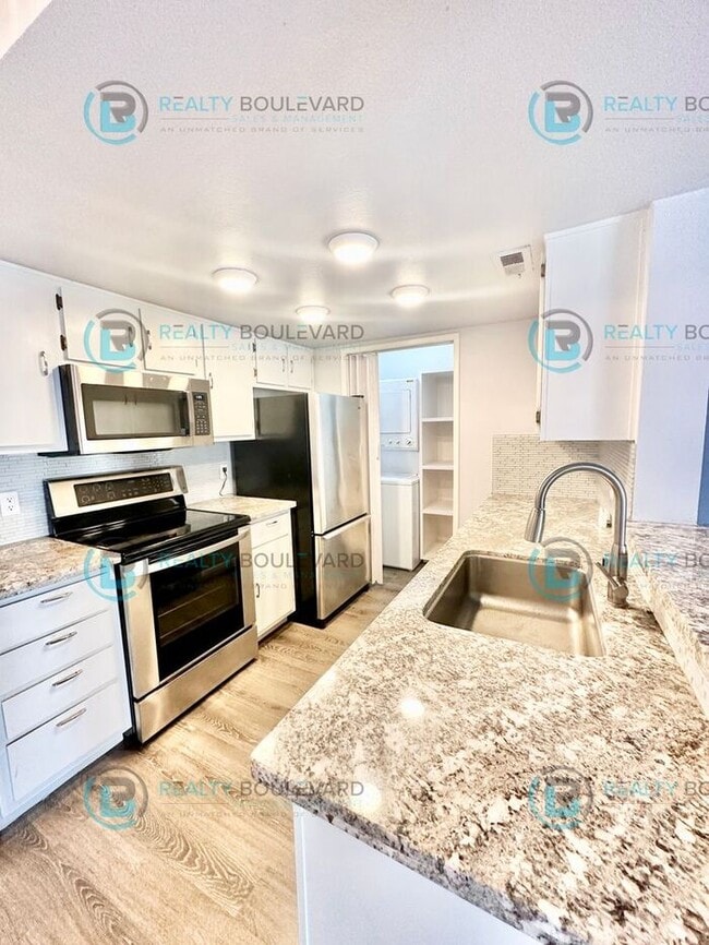Building Photo - 1/2 Month Free!! Indulge in comfortable living at Wood Chase Condos!