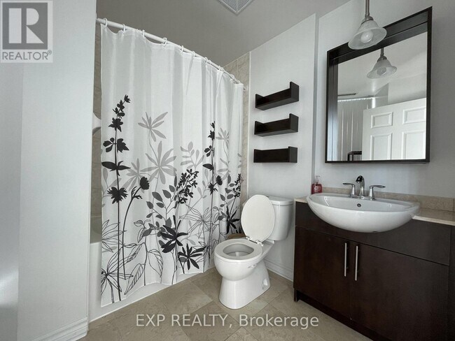 Photo du bâtiment - 18 Holmes Ave