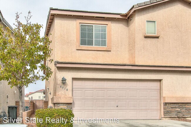Building Photo - 2 br, 2.5 bath House - 6578 MARILYN MONROE...