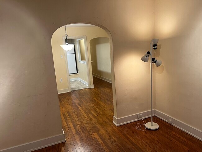 Living room into dining room - 517 S Braddock Ave