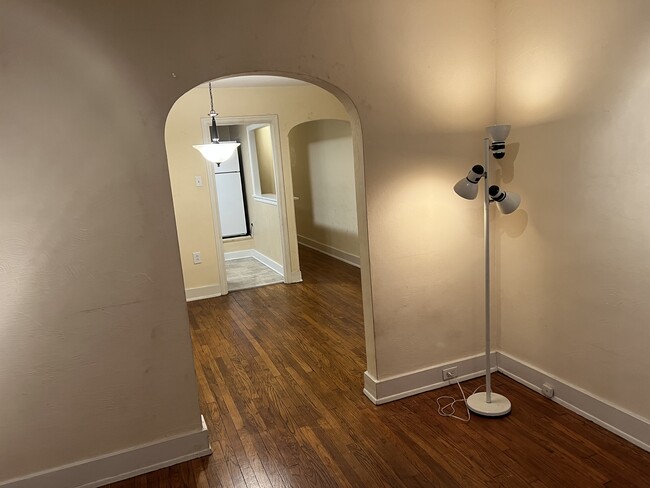 Living room into dining room - 517 S Braddock Ave