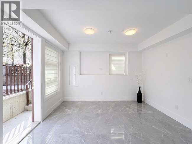Building Photo - 10XX E 62nd Ave