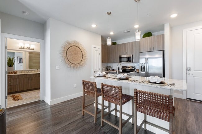 Spacious Kitchen with Island - Overture Albuquerque 55+ Active Adult Apartment Homes