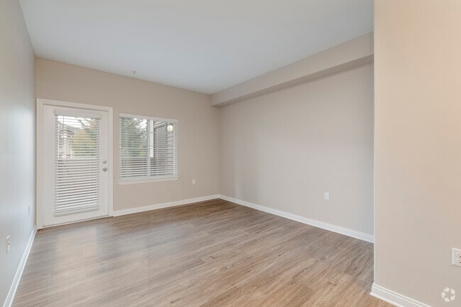 The Birch - Living Room *1BR, 1BA - 903SF - Living Room - Woodland