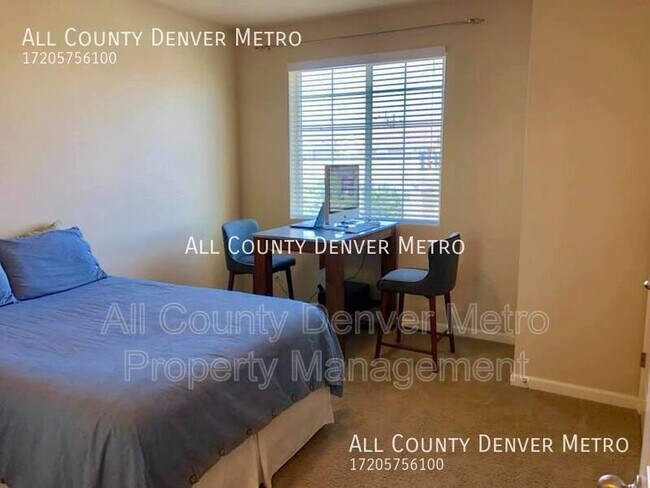 Photo - 16285 W 62nd Ln Townhome