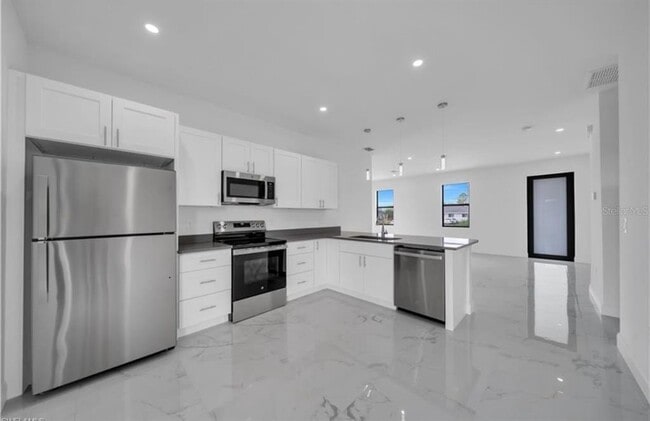 Building Photo - 4646 Leonard Blvd S