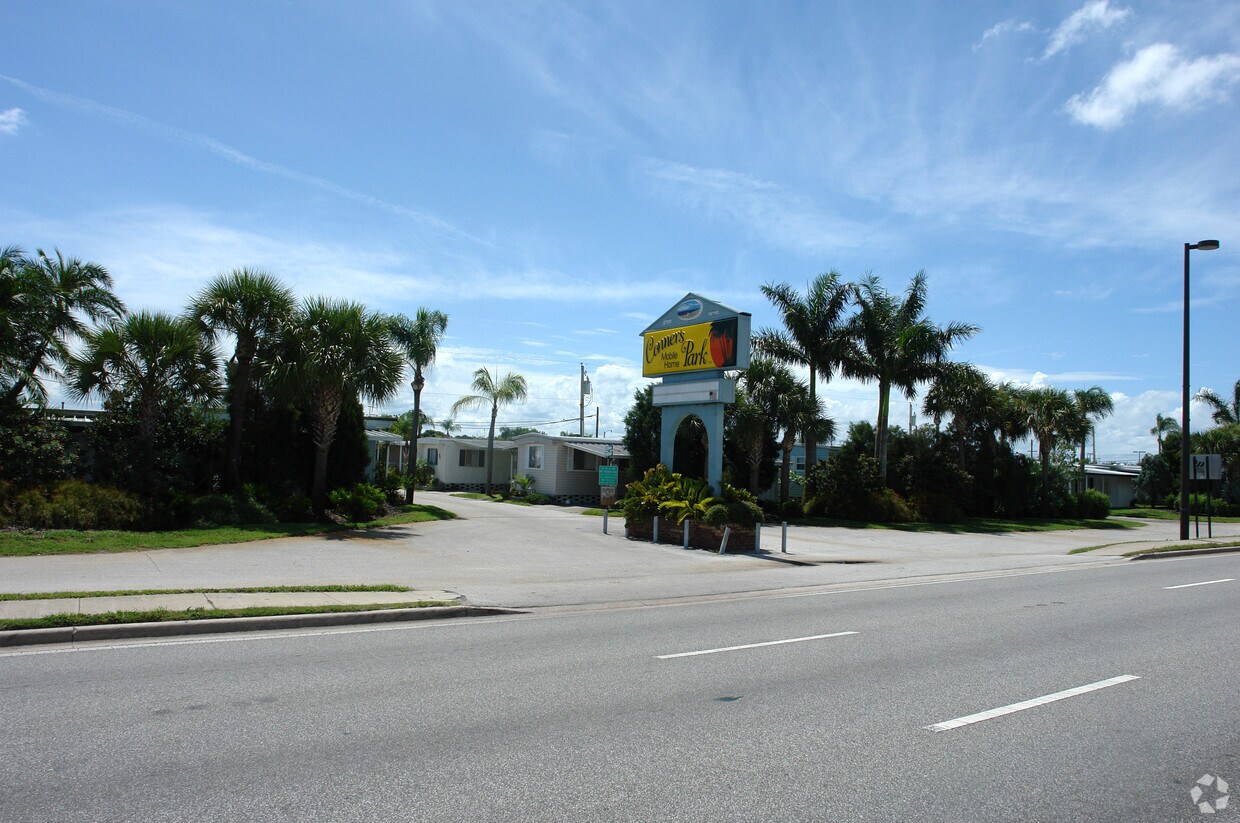 Building Photo - Pelican Palm Village