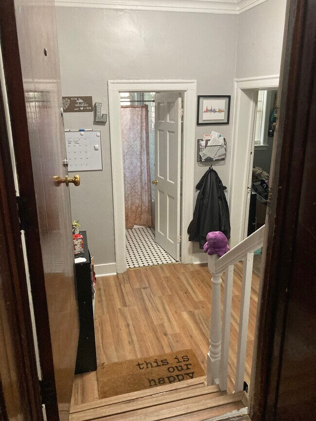 Straight is the full bathroom, living and bed rms on your right, the dining and kitchen to the left. - 2134 W Arthur Ave