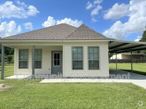 Building Photo - 7677 River Ridge Dr